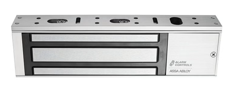 Verkada Installers A silver and black electromagnetic door lock with mounting holes, labeled Alarm Controls ASSA ABLOY, designed for security and access control systems by Jendy Physical Security. Ideal for Verkada installers seeking reliable protection.