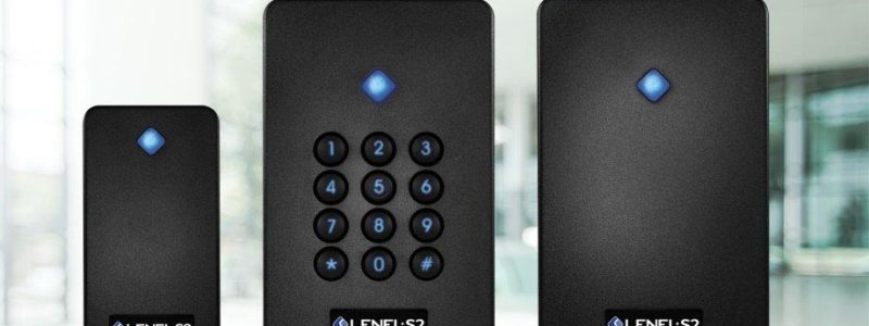 Verkada Installers Three black LenelS2 security access devices are shown: a card reader, a keypad reader with numbers 0–9 and two function keys, and a larger reader. Each features a blue LED indicator—ideal for enhancing Jendy Physical Security systems.